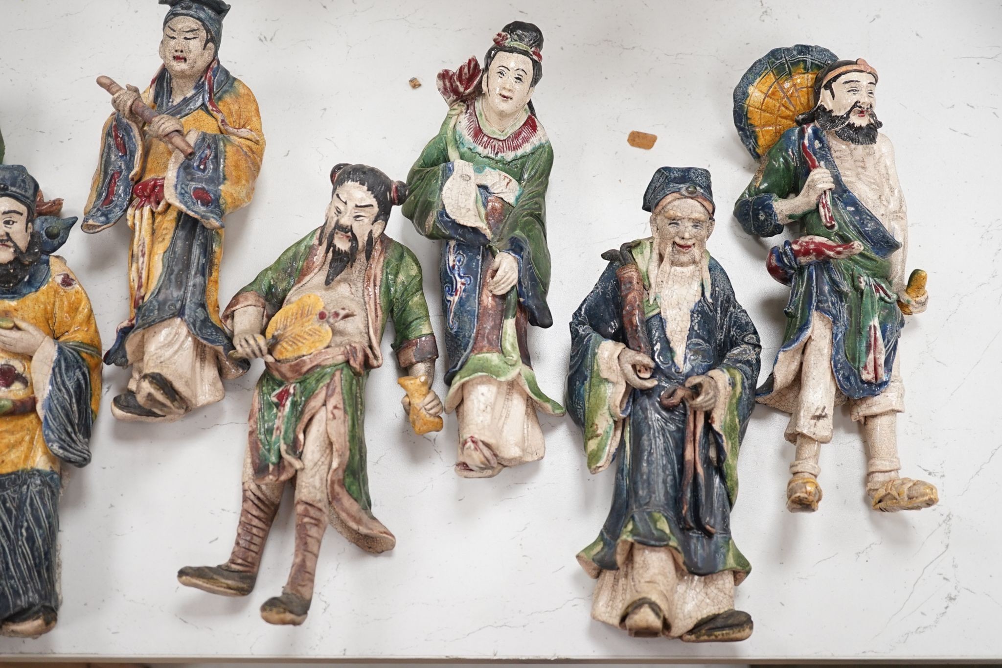 A set Chinese pottery figures of the eight immortals 24cm